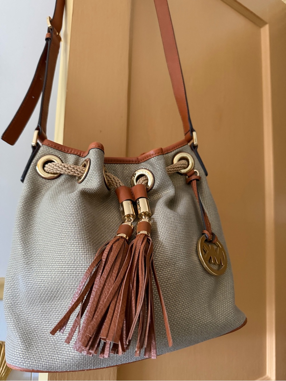 Michael Kors bucket crossbody bag, gold and brown
